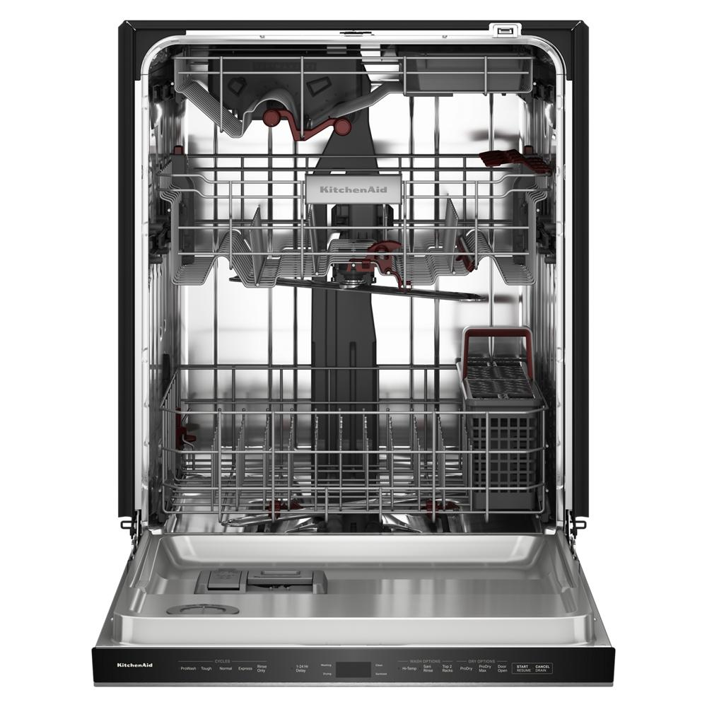 Open stainless steel dishwasher interior with three adjustable racks and utensil basket, KitchenAid appliance.