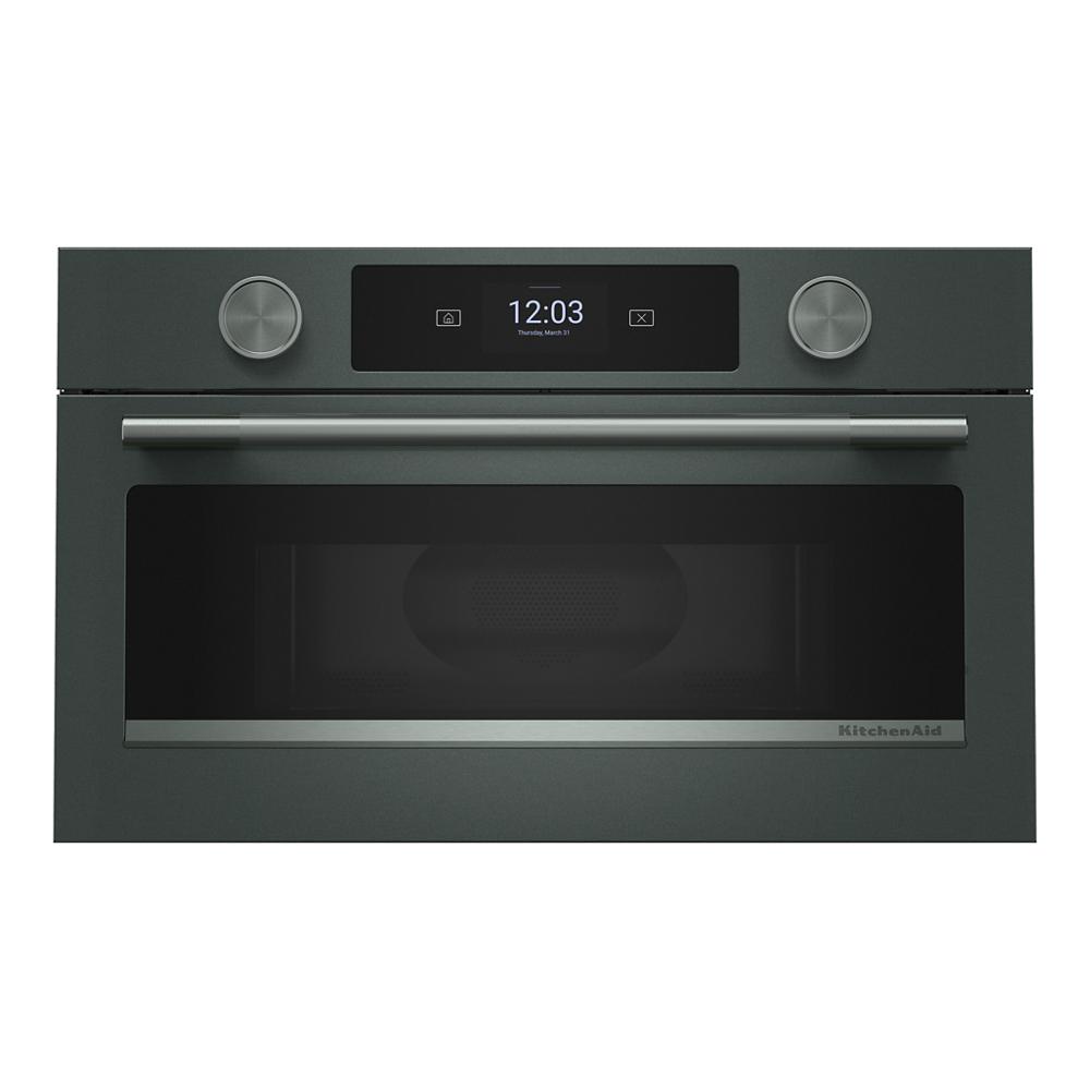Built-in matte black microwave oven with digital display, dual control knobs, and stainless steel handle from KitchenAid appliances collection