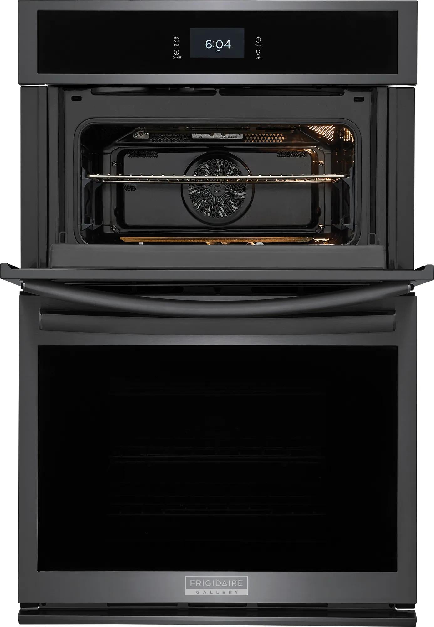Open black built-in electric wall oven with visible convection fan and digital clock display in kitchen appliances