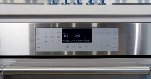 Stainless steel oven control panel with digital display and touch buttons in Thermador Wall Ovens collection