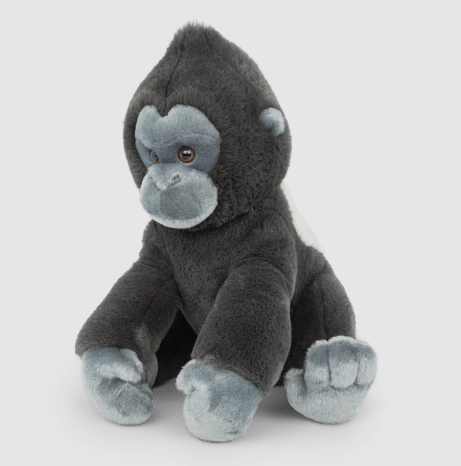Plush gorilla toy with dark gray fur and lighter gray face, hands, and feet sitting upright on a white background