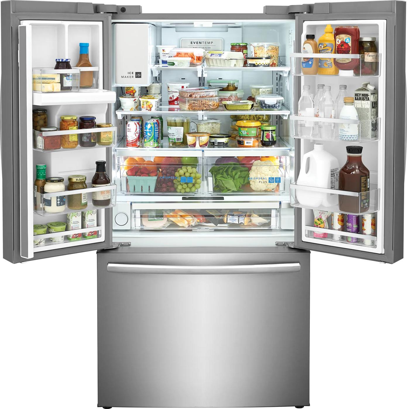 French door refrigerator with stainless steel finish, fully stocked interior, and organized shelving in Appliances collection