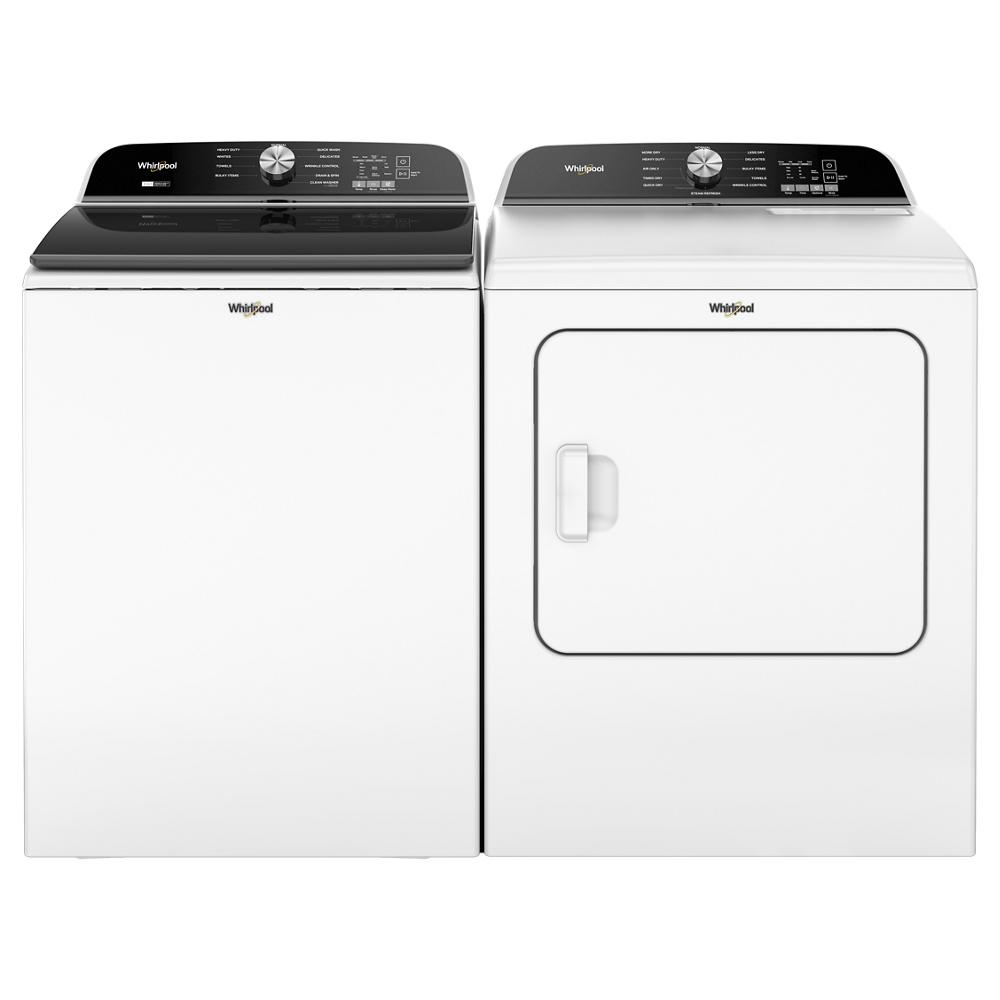 White Whirlpool top load washer and matching front load gas dryer side by side in laundry appliance set