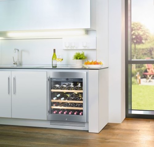 stainless steel built-in wine storage cabinet with wooden shelves in modern kitchen and home appliances collection