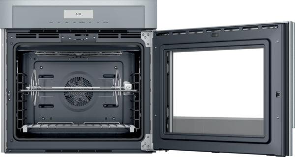 Thermador stainless steel wall oven with right side door open showing oven cavity and cooking racks from kitchen appliances collection