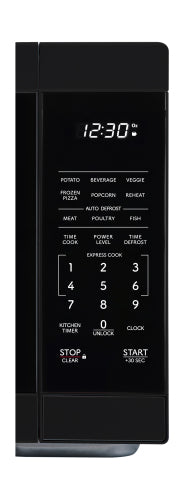 Close-up of black countertop microwave oven control panel with digital clock and preset cooking buttons in kitchen appliances collection