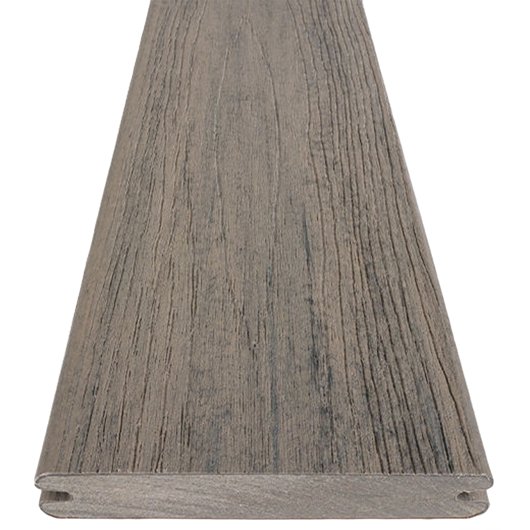 Grooved composite decking board in driftwood tone with natural wood grain texture for durable outdoor home improvement projects