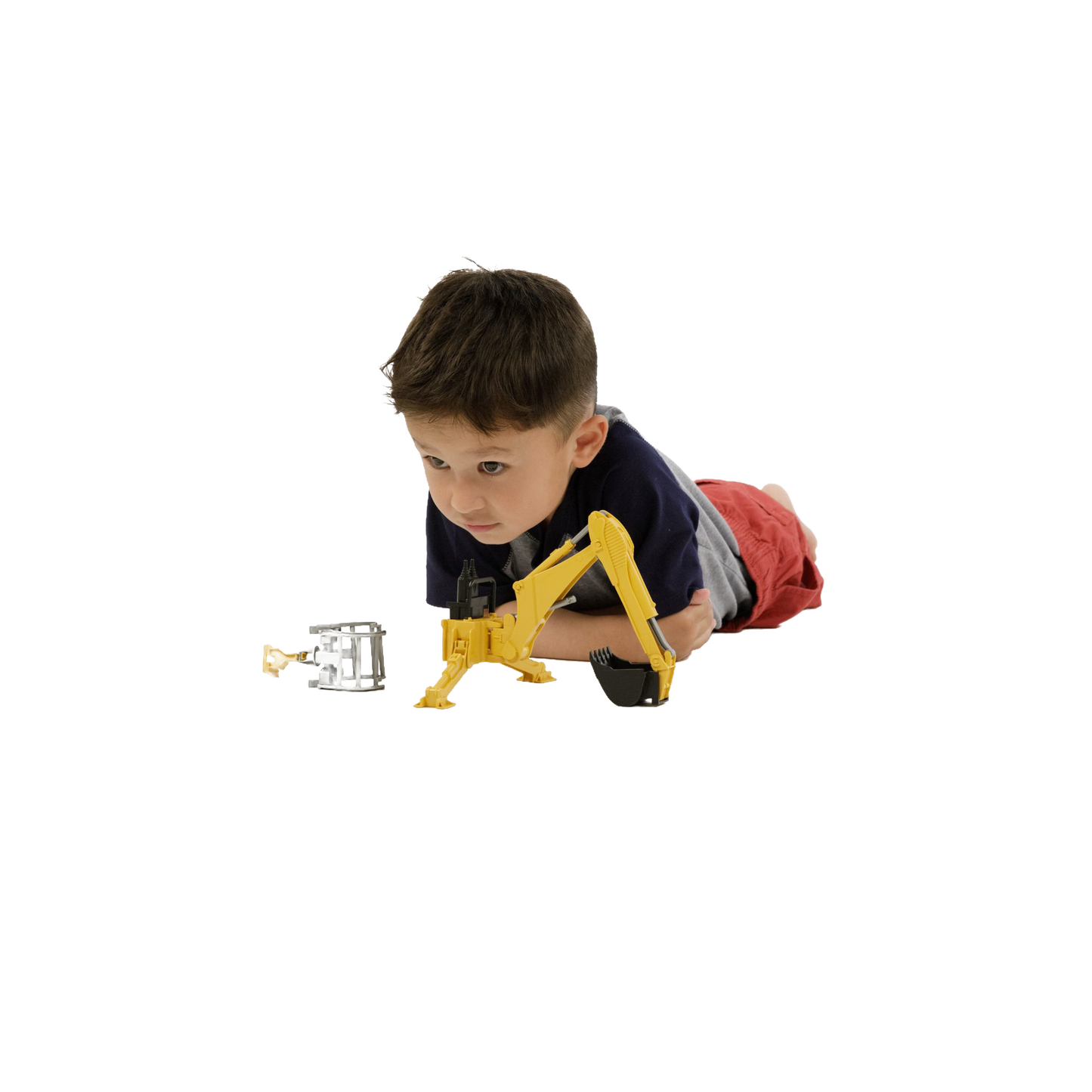 Young child lying on floor playing with yellow Bruder rear hydraulic arm toy in Toys & Games and Bruder Toys collections
