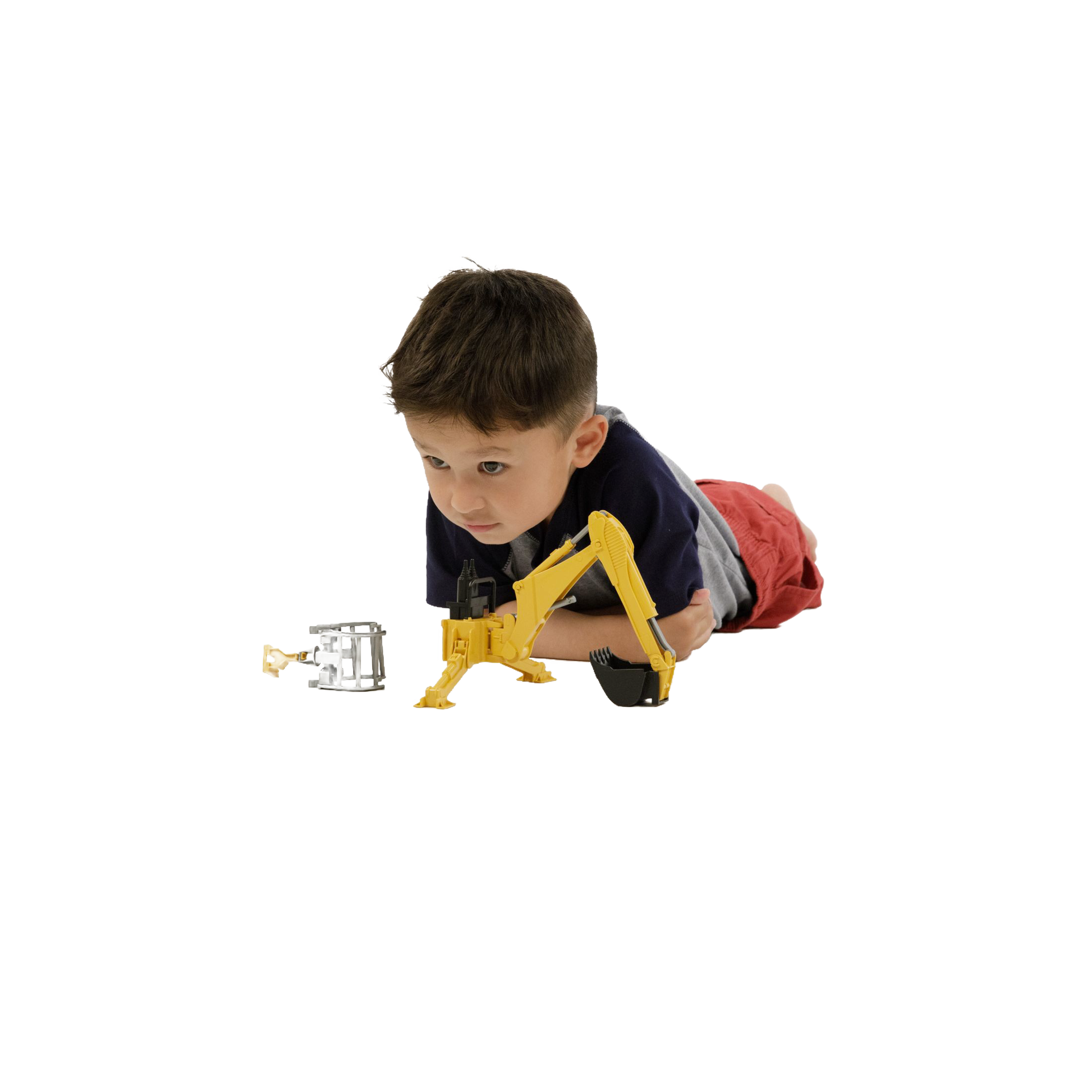 Young child lying on floor playing with yellow Bruder rear hydraulic arm toy in Toys & Games and Bruder Toys collections