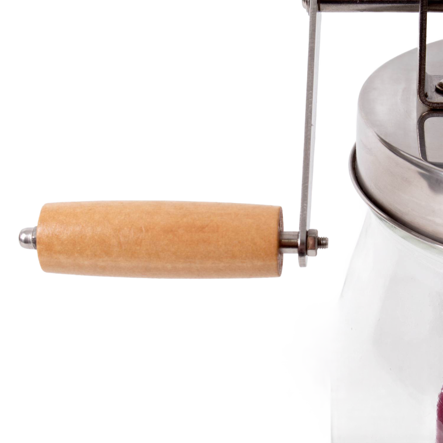 Wooden handled crank attached to a stainless steel and glass mini butter churn for kitchen gadgets collection