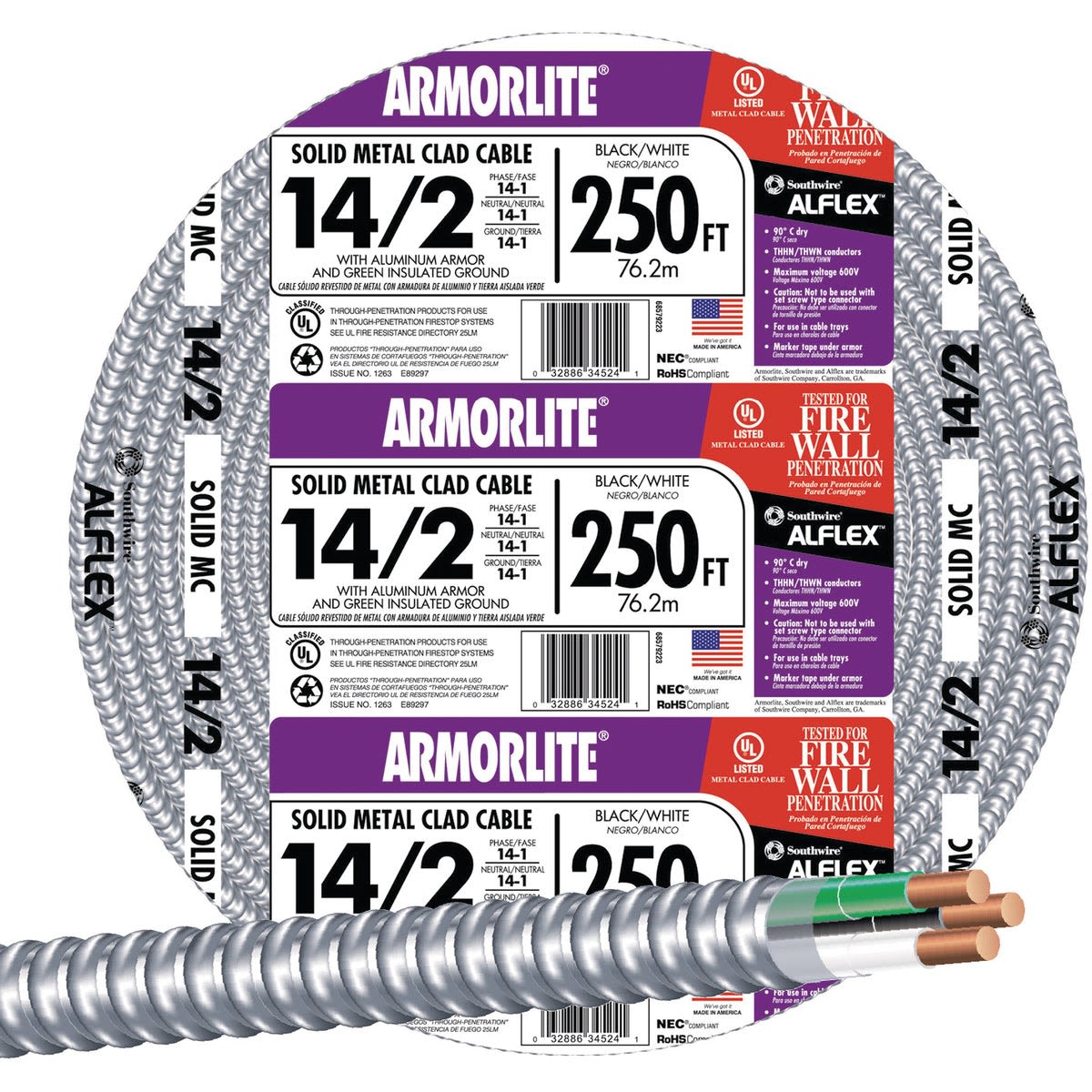 Coiled armored electrical cable with aluminum metal cladding and green ground wire for electrical wiring projects