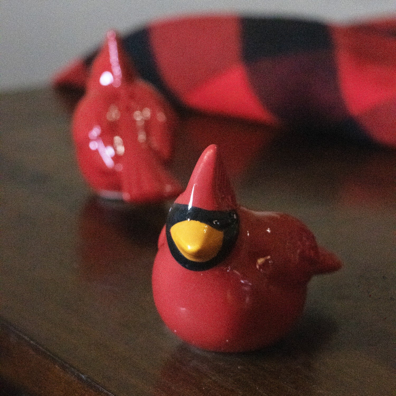 Glossy red ceramic cardinal salt and pepper shakers with yellow beaks for Christmas kitchenware and kitchen gadgets collections under $50