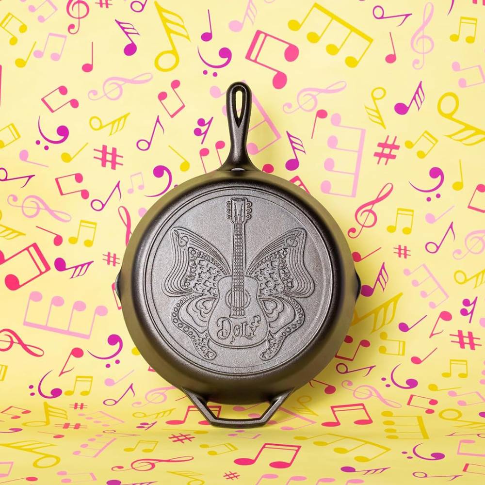 12-inch cast iron skillet with intricate guitar and butterfly design, durable kitchenware from Lodge Cast Iron collection