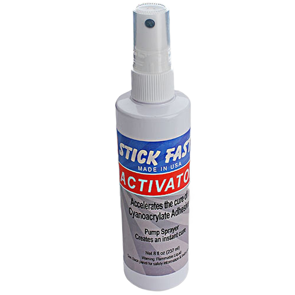 White pump spray bottle of adhesive activator for accelerating cyanoacrylate glue curing in home improvement tasks