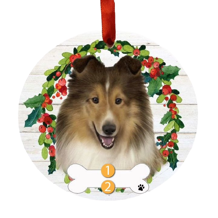 Round Christmas ornament featuring a smiling Sheltie dog face inside a festive holly wreath with red berries