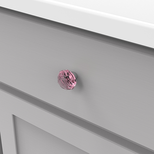 Pink crystal glass knob with chrome base on gray bathroom vanity in home improvement hardware collection under $50