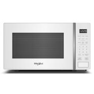 White countertop microwave with digital controls, LED display, and steam clean feature in kitchen and appliance collections