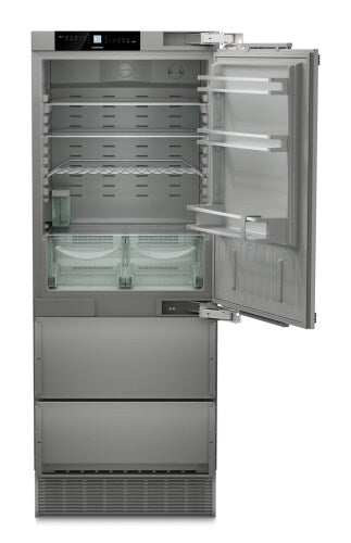 Built-in refrigerator freezer with right hinge, open door showing adjustable shelves and clear vegetable drawers in Appliances collection