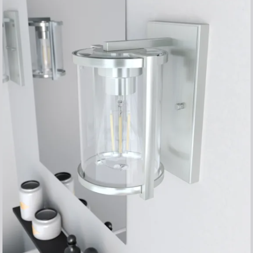 Brushed nickel wall sconce with clear glass shade, ideal for bathroom and vanity lighting in modern home interiors
