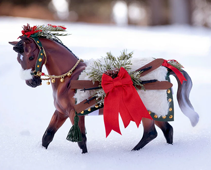Bay warmblood horse figurine dressed in faux fur and leather with holiday greenery and a red bow for Toys & Games under $100