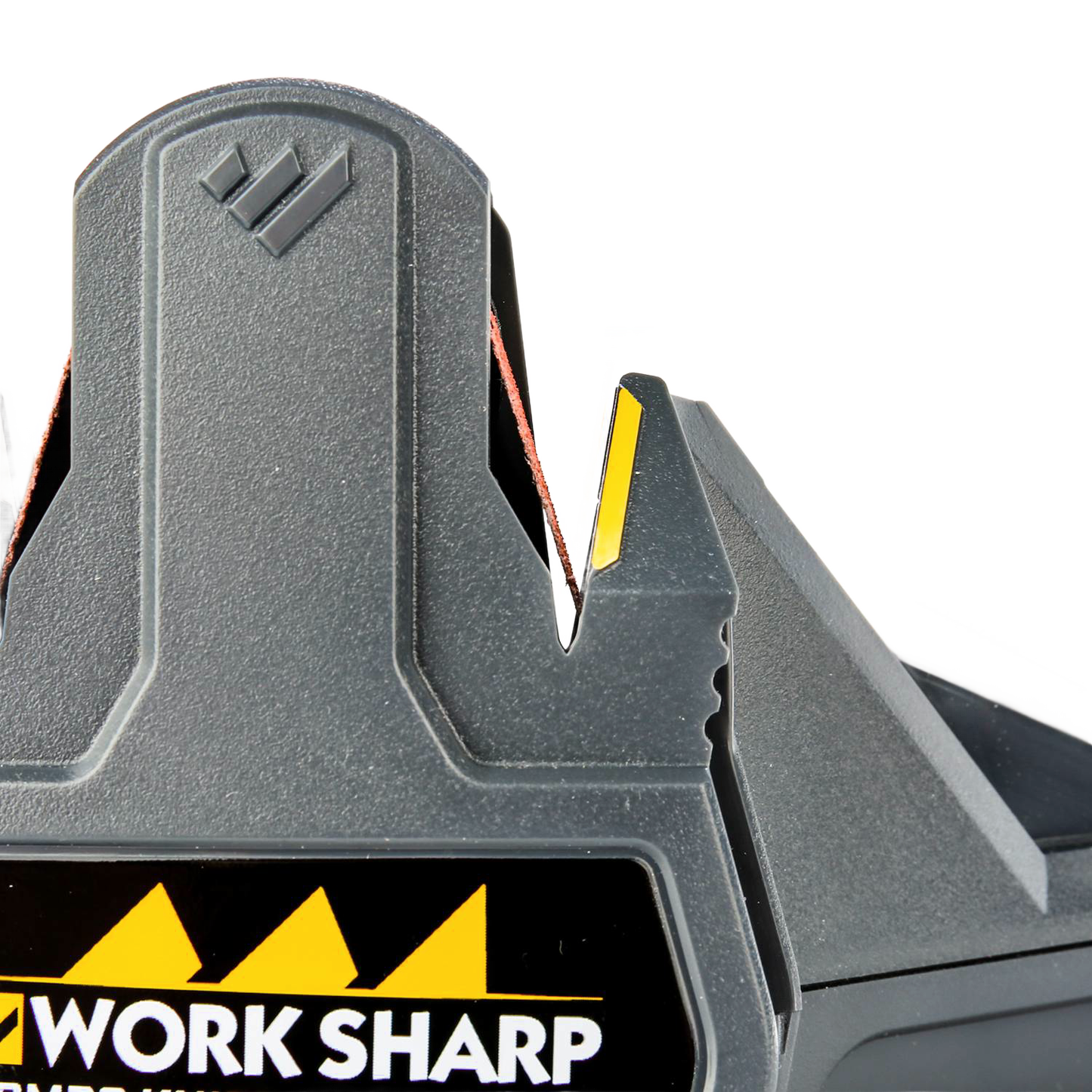 Gray and yellow combo knife sharpener with textured grip and angled slots for woodworking tools and home improvement use