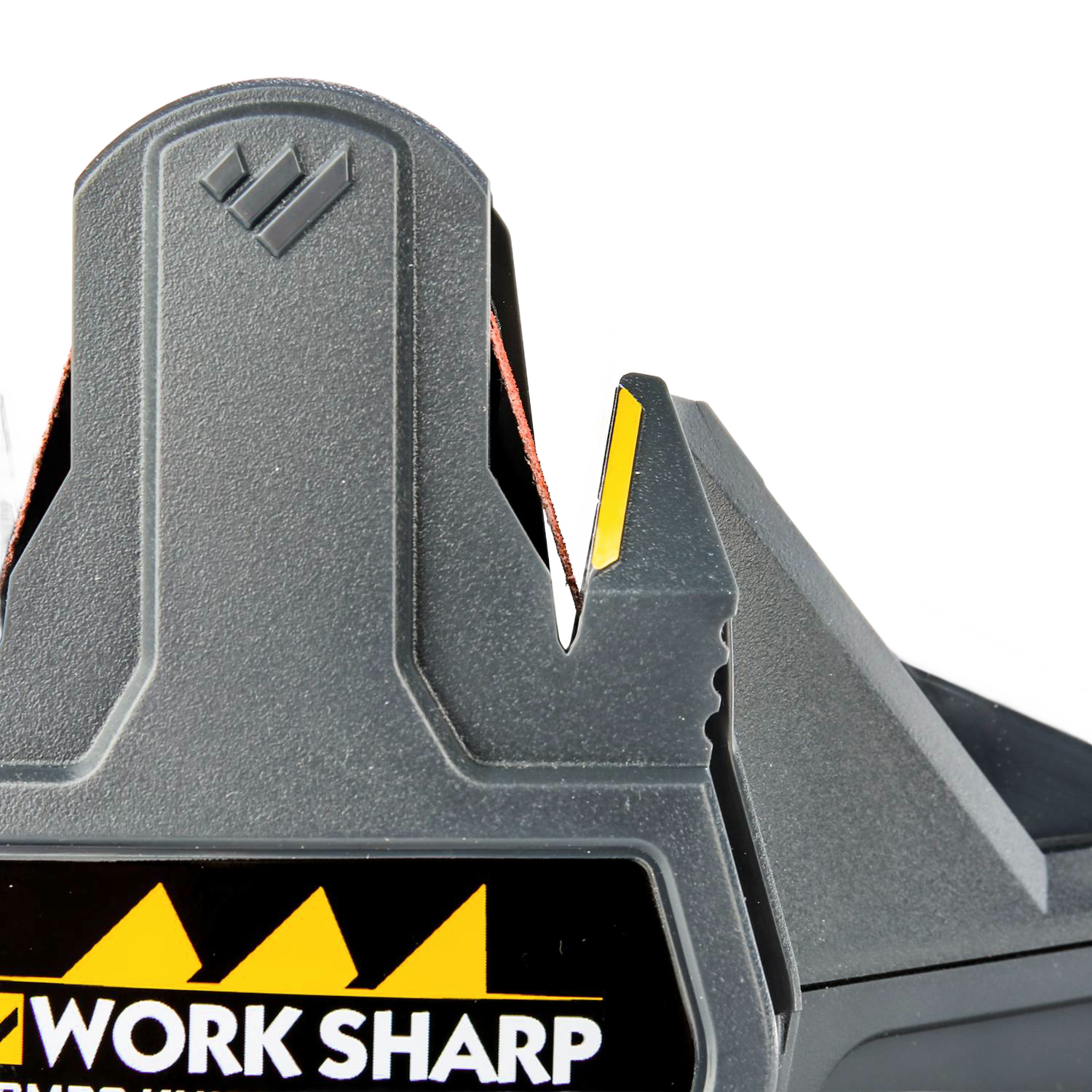 Gray and yellow combo knife sharpener with textured grip and angled slots for woodworking tools and home improvement use