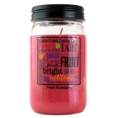 Pink jar candle with black lid featuring fresh strawberry scent label for home ambiance and decor