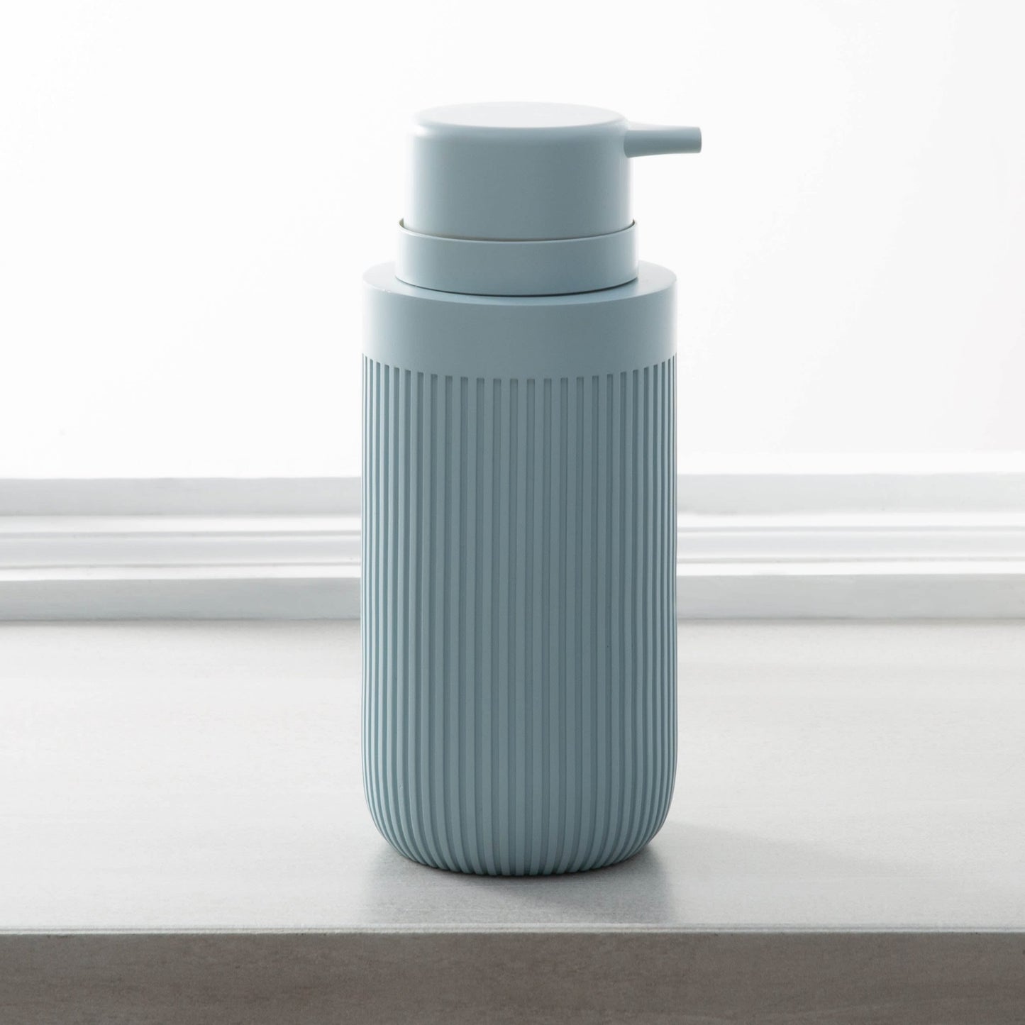 Blue resin lotion pump with ribbed design, ideal for bathroom use and accessible home improvement under $50 collections