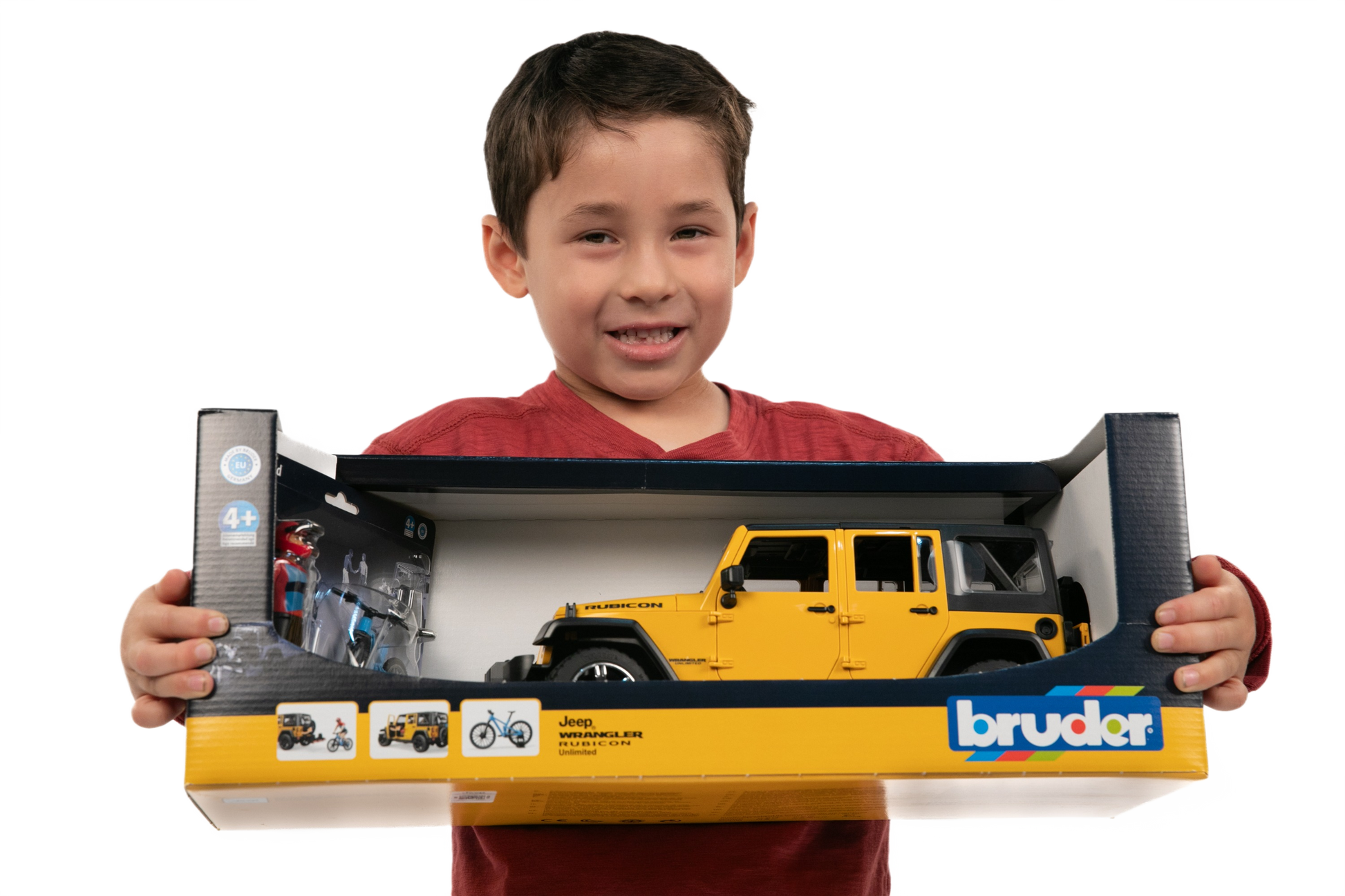 Child holding Bruder yellow Jeep Wrangler Rubicon Unlimited toy with bike and cyclist from Vehicles & Remote Controlled Toys collection