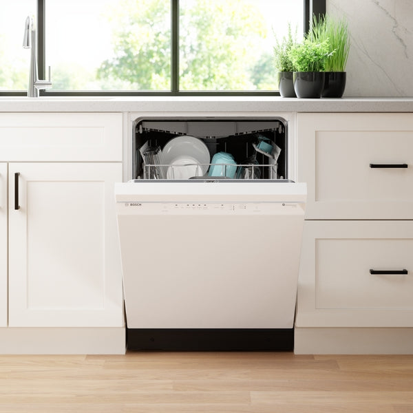 White Bosch dishwasher with open door filled with dishes in a modern kitchen from Dishwashers and Appliances collection