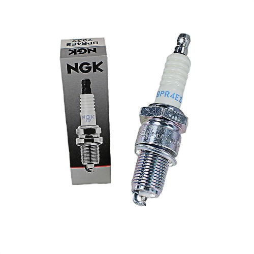 Spark plug with white ceramic insulator and metal base displayed beside branded gray packaging for tools use