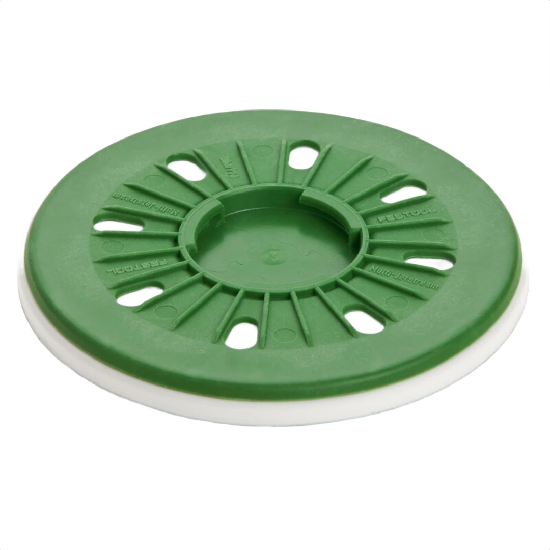 Green and white polishing pad designed for use with power tools in home improvement and detailing tasks