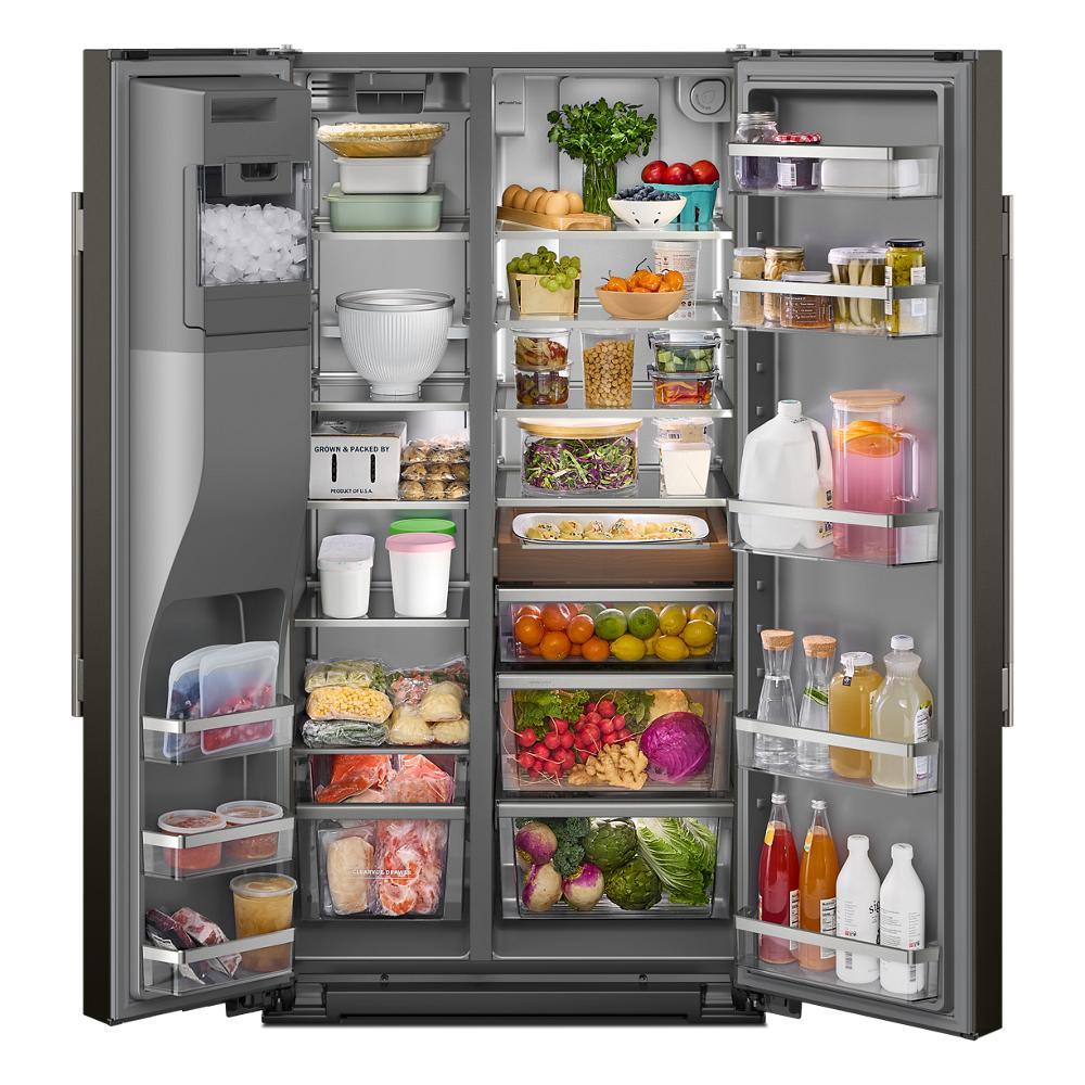 Open counter-depth side-by-side refrigerator in juniper with organized shelves and exterior ice and water dispenser in refrigerators collection