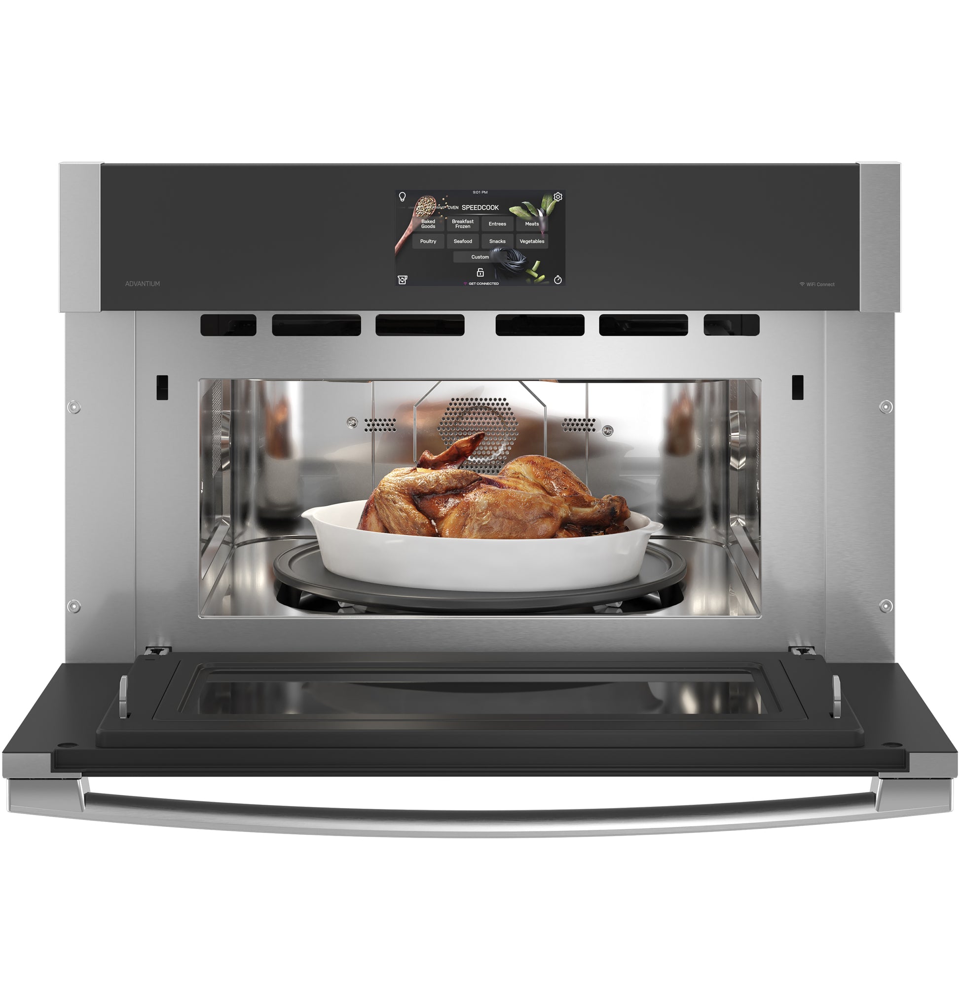 open stainless steel single wall oven with digital touchscreen and a roast chicken inside in appliances collection