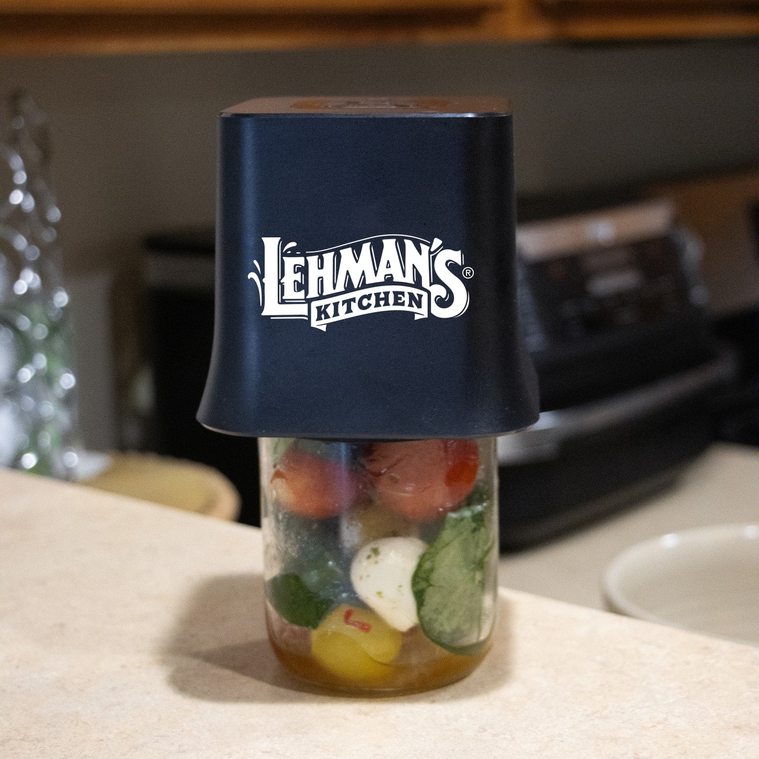 Lehman's cordless vacuum sealer on glass jar filled with vegetables, part of Kitchenware and Small Kitchen Appliances collections