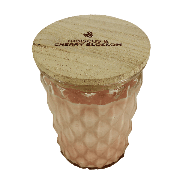 Pink textured glass jar candle with wooden lid engraved Hibiscus and Cherry Blossom fragrance name