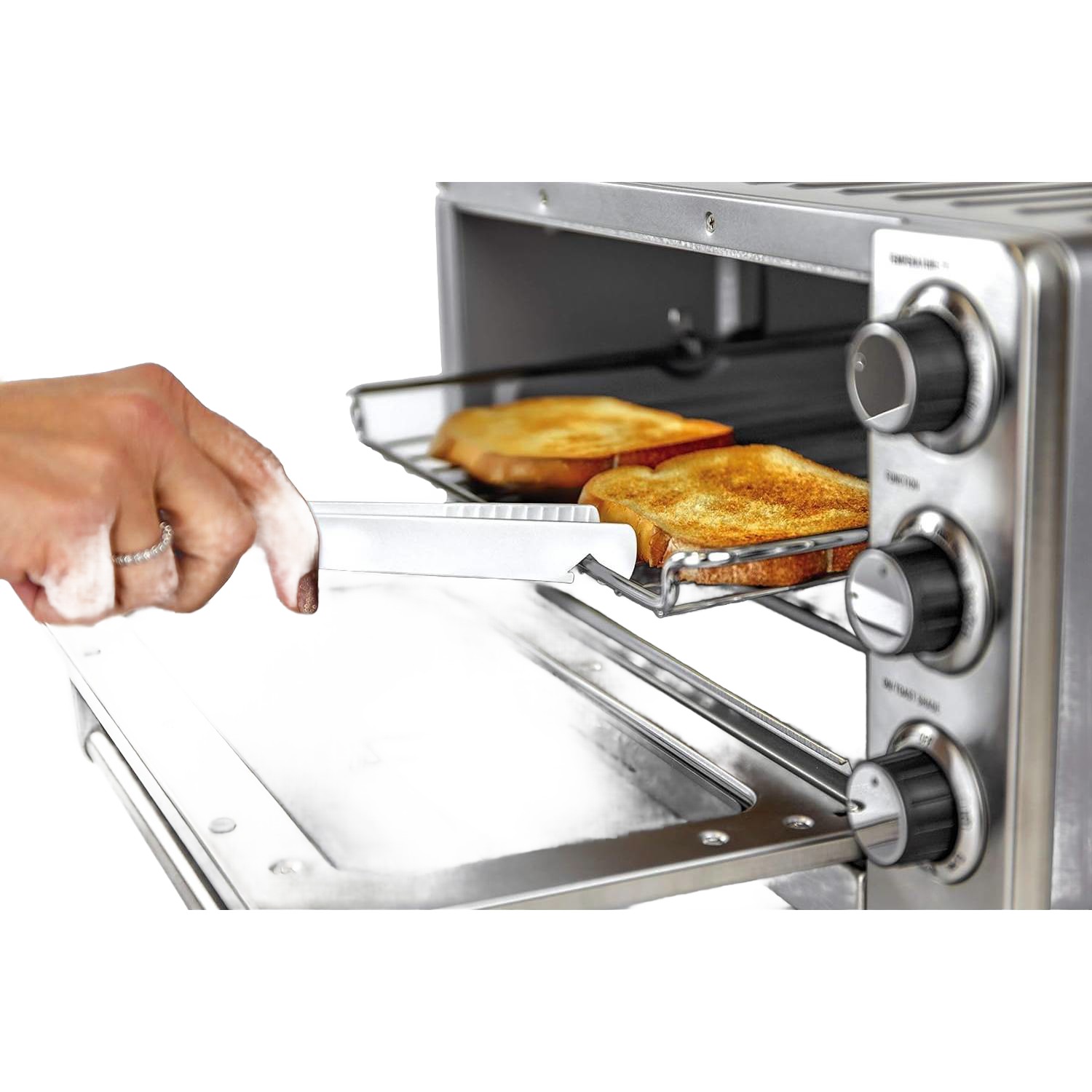 White heat-resistant silicone toaster tongs with serrated grip lifting toast from toaster oven under $50 kitchen storage tool