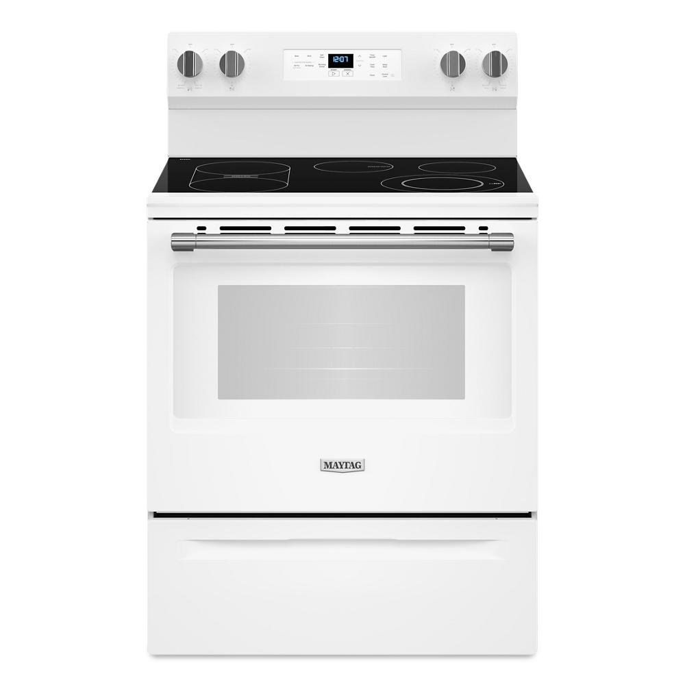 White electric range with smooth glass cooktop, control knobs, digital display, and large oven window from Appliances collection