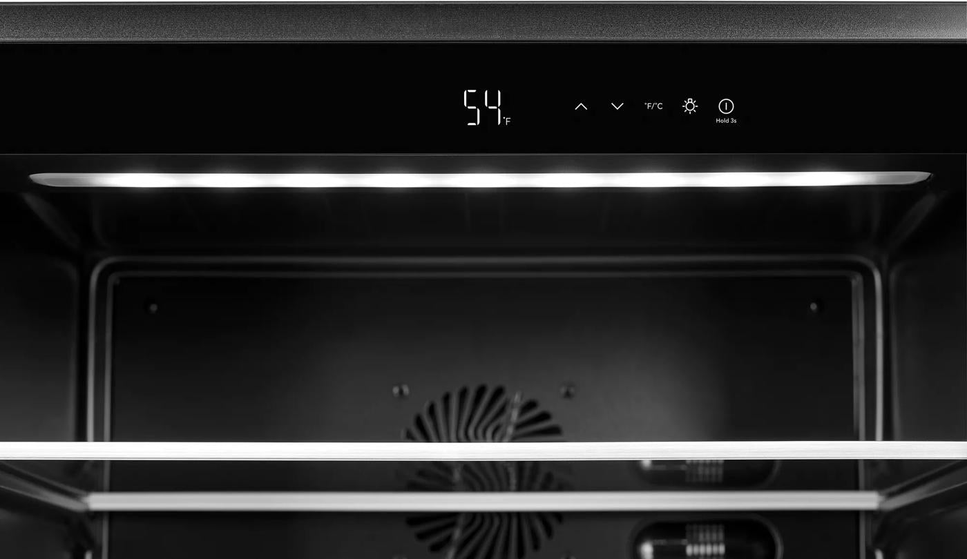 Interior view of a beverage center showing electronic temperature controls, LED lighting, and glass shelving, featured in kitchenware and appliance collections.