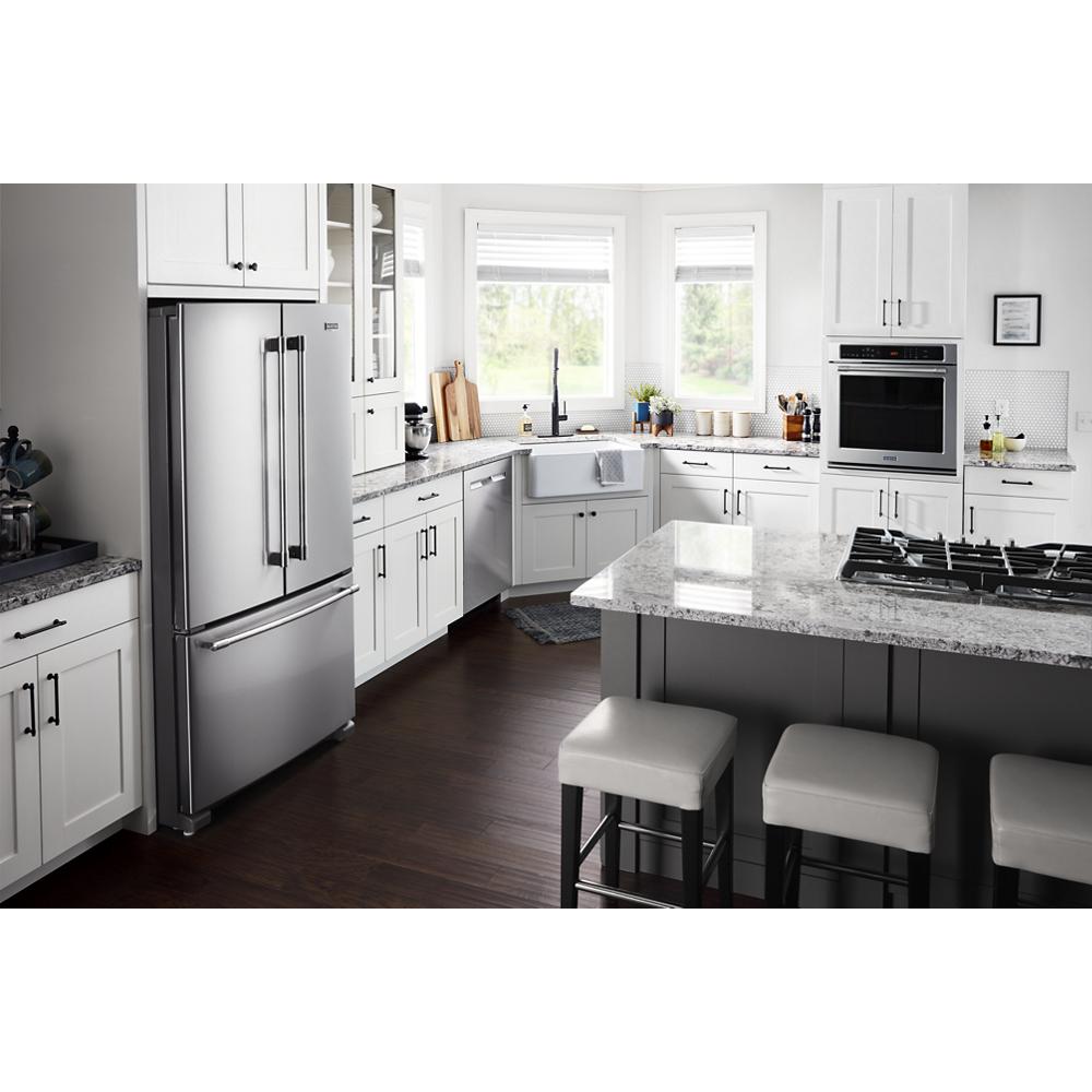 Modern kitchen with stainless steel French door refrigerator, gas cooktop on island, white cabinets, and hardwood floors from Appliances collection