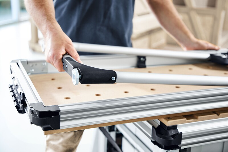 Adjustable extension table with perforated wooden top and aluminum frame for woodworking and tool stands collections
