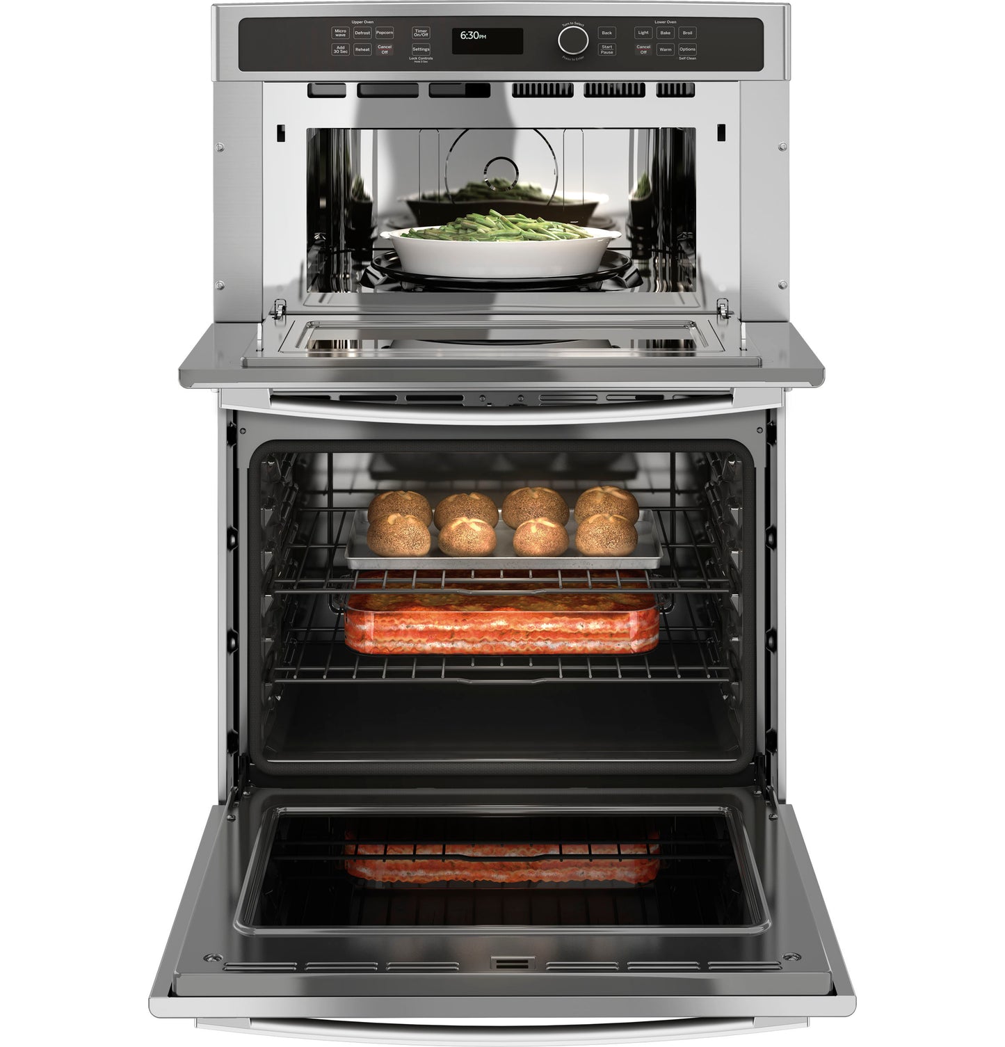 Double wall oven with stainless steel finish baking bread rolls and casserole dish, part of kitchen appliances collection