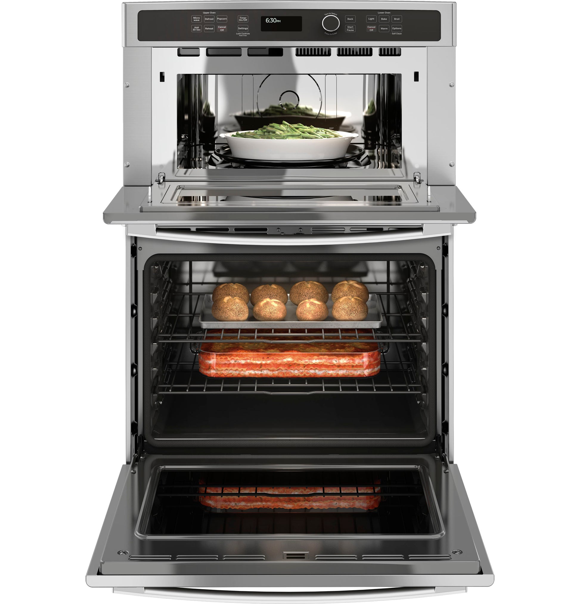 Double wall oven with stainless steel finish baking bread rolls and casserole dish, part of kitchen appliances collection