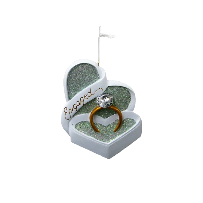 Heart-shaped Christmas ornament with glittery interior, featuring a gold engagement ring and "Engaged" script banner