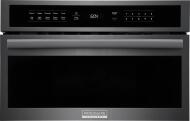 Built-in stainless steel microwave oven with drop-down door and digital control panel in kitchen appliances collection