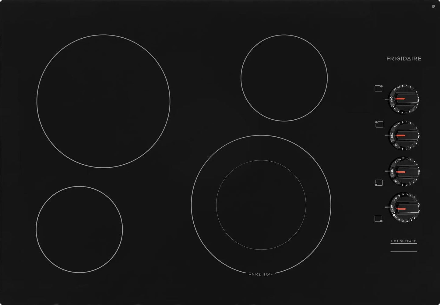 Black electric cooktop with five circular heating elements and four control knobs for kitchen appliances