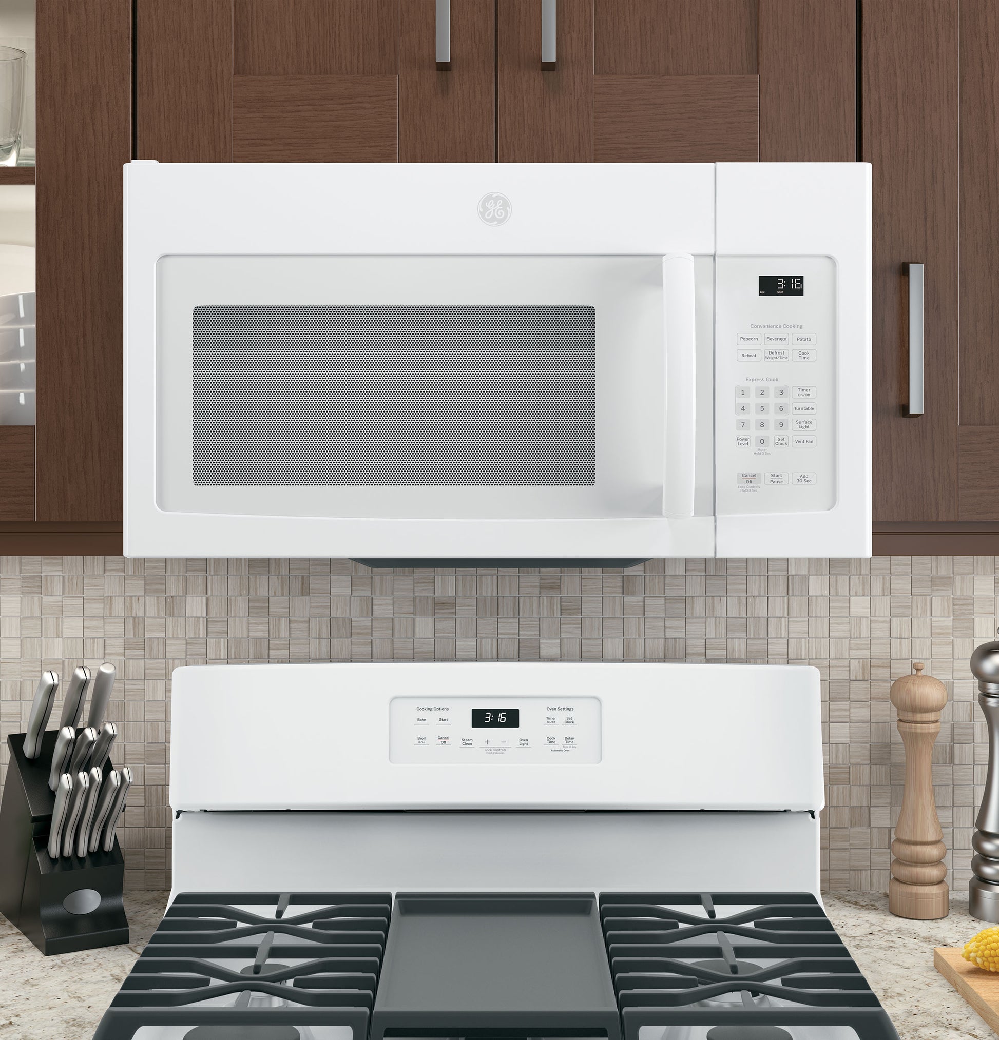 White over-the-range microwave with digital control panel installed above stove in modern kitchen setting