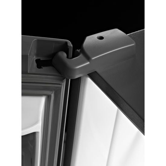 Close-up of heavy-duty hinge mechanism on a stainless steel french door refrigerator from Appliances collection