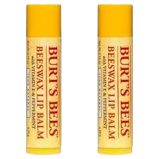 Two yellow tubes of Burt's Bees natural beeswax lip balm in simple packaging for personal care use