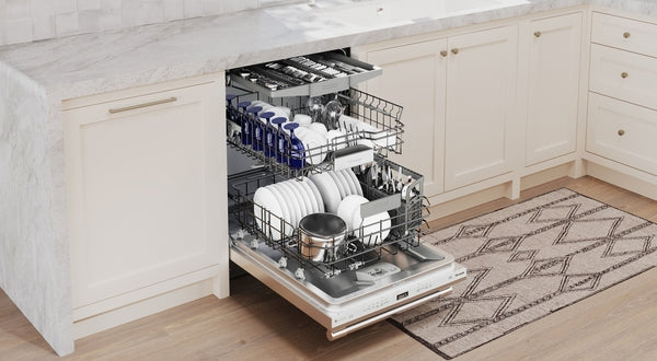 Open 24-inch stainless steel dishwasher filled with dishes and cookware in modern kitchen setting from dishwashers collection